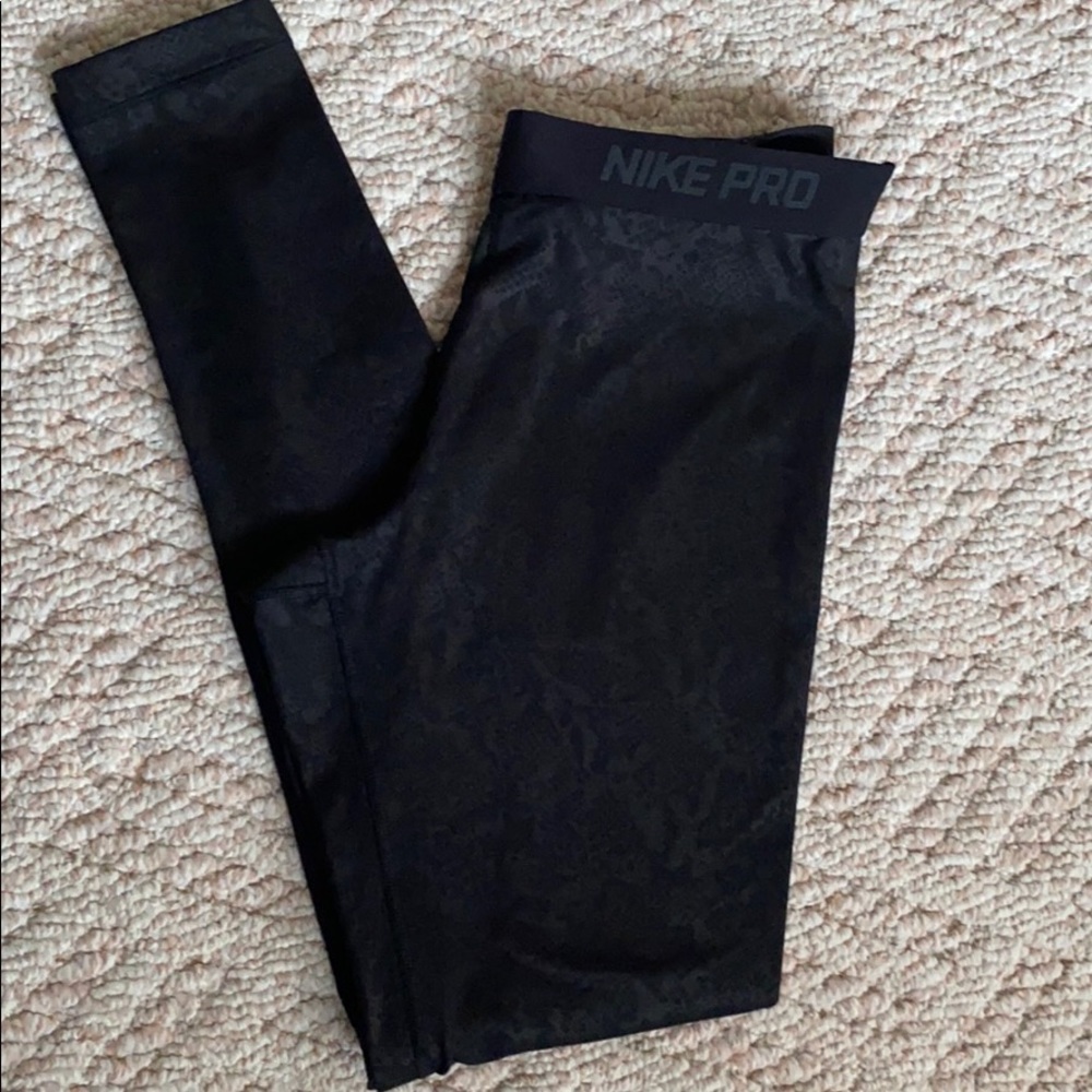 Nike Pro DRI-FIT legging with animal print.